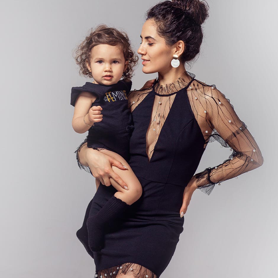 woman and child in black dresses