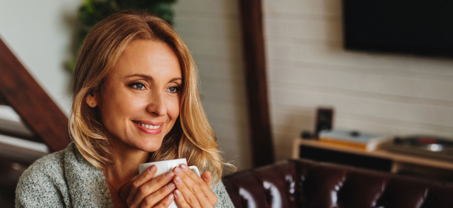 woman holding coffee