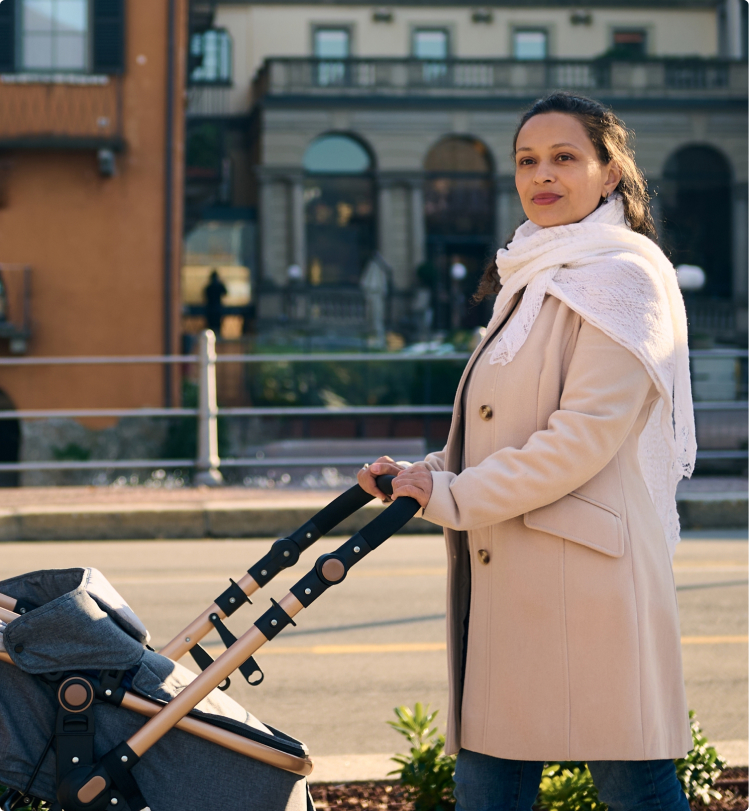 chicago woman in coat pushing stroller